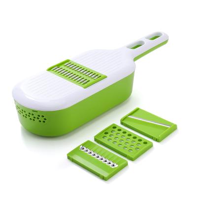 China Viable Multifunctional Plastic Plastic Slicer Manual Potato Peeler Slicer Garlic Peeler Garlic Grind Carrot Onion Grater for sale