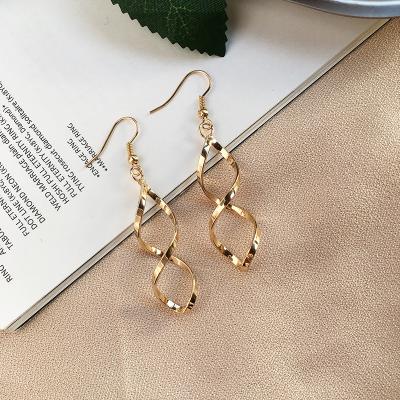 China Trendy Creative Twisted Female Earrings Fashion Twist Metal Drop Earrings for sale