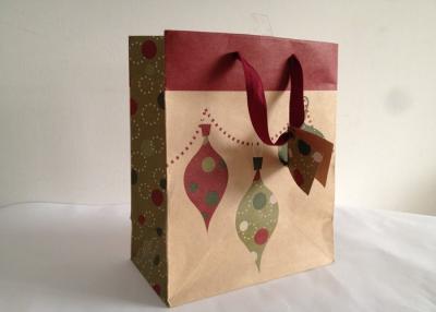 China Eco Friendily 150gsm Brown Kraft Carrier Paper Bags with Ribbon and Tags Printed for sale