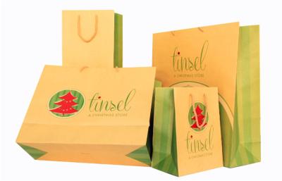 China Environmental 180gsm White Kraft Printed Paper Carrier Bags For Packing / Promotion for sale