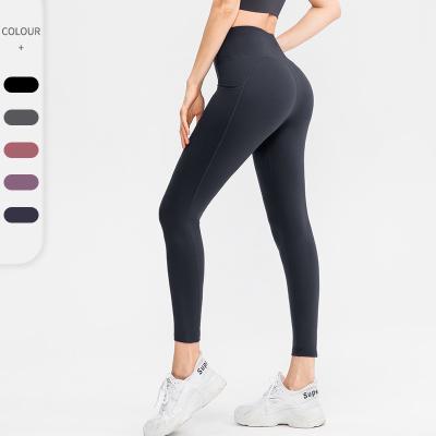 China Sustainable Women's Yoga Fitness Pants With Pocket Sports Running Tight Breathable High Waist Hips Exercising Pants for sale