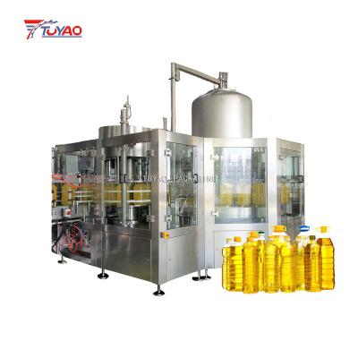 China Food A-Z olive oil filling machine rotary weighing scale sunflower oil filling machine cooking oil filling machine for sale