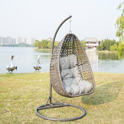 China Modern Outdoor Patio Rattan Wicker Swing Chair Egg Chair With Metal Stand for sale