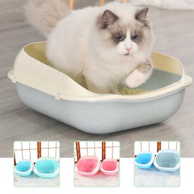 China Large Capacity Environmentally Friendly High Rim Easy Cleanable Plastic Pet Toilet Cat Litter Box With Open Lid And Scoop for sale