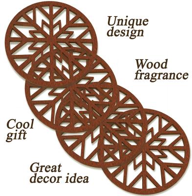 China Sustainable Christmas Decoration 4pcs Carved Wooden Snowflake Coasters For Drinks for sale