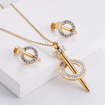 China FRIENDLY Trendy Friend Rhinestone Spike Nail Necklace Earrings Stainless Steel Sets Jewelry For Party for sale