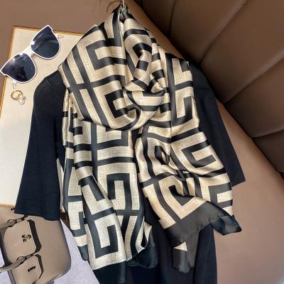 China 2021 New Arrival Wholesale Silk Printed Scarves Ladies Fashion Brand Imitated Design Women Scarves And Shawl Long for sale