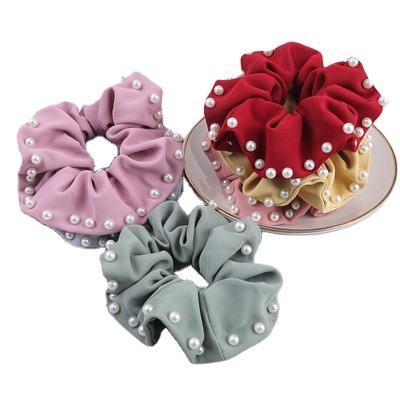 China 2021Sale fashionable fashion women hair accessories large pure color hair band fabric elastic pearl hair scrunchies for sale