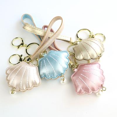 China Factory Wholesale Natural and Cool Custom Shell Shape PU Leather Key Chain for sale