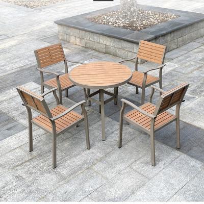 China Eco-Environmently New Style Detachable Outdoor Dining Furniture Set All Weather Used Wood Plastic Table And PVC Chairs for sale