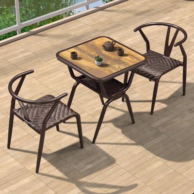 China Modern Metal Rattan Table And Chairs For Outdoor Leisure Table Chair Balcony for sale