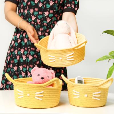 China Mini Sustainable Cotton Rope Woven Sundries Storage Basket Baby Toys Keys Yellow Cat Kids Product for sale