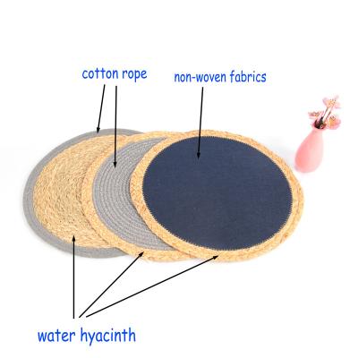 China Viable Cheap Price Eco-friendly Handmade Round Dining Table Place Mats Water Grass Cotton Rope Place Mat Wholesale for sale