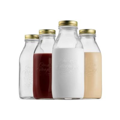 China Clear Beverage Beverage Glass Bottle Cap Cold Pressed Juice Bottles With Airtight Screw for sale