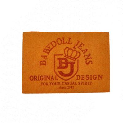 China Luxury Style Sustainable Plastic Printing Leather Labels / Leather Patch For Garment / Shoes / Jeans for sale