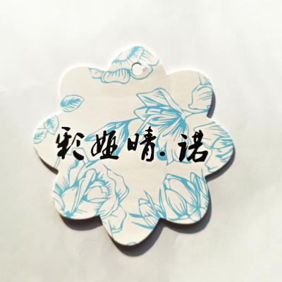 China New Viable Custom Design Die Cut Shape Specail Hang Tags For Clothes for sale