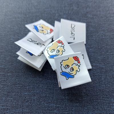 China Colored Logo Name Garment Custom100%Polyester Ribbon 3CM Sustainable High Density Printing Labels Used For Bags / Wedding Dress for sale