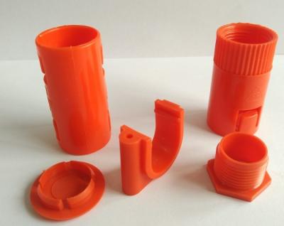 China Orange ABS Plastic Injection Molded Parts Multi Cavity For Vending Machine for sale