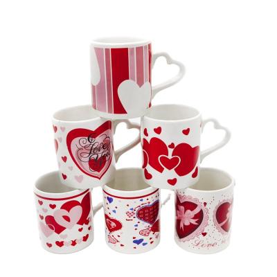 China Viable most popular heart handle ceramic mug design for festival promotion for sale for sale