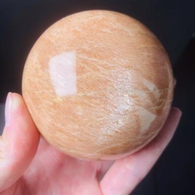 China China wholesale natural peach moonstone sphere with good instant healing quartz crystal ball folk crafts for sale