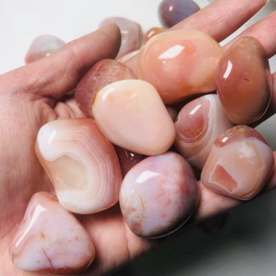 China China Wholesale Bulk Natural Apricot Agate Tumbled Polished Healing Pink Agate Tumbled Crystal Chakra Decorated Stones for sale