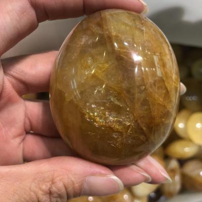 China Wholesale High Quality Polished China Folk Healer Palm Stone Natural Stone Gold Crystals Folk Crafts For Decoration for sale