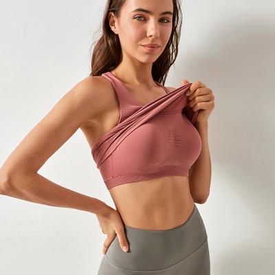 China Seamless Anti-Smell Workout Tank Tops For Women Sporty Racerback Tank Tops Sports Shirts With Built In Bra Yoga Wear Custom Logo for sale