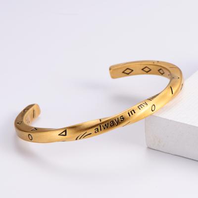 China Vintage Jewelry Wholesale Geometric 18k Gold Stainless Steel Mobius Cuff Bangle Twisted Bracelet For Men for sale