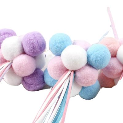 China Low Price Funny Soft Sustainable Cat Toy Stick Luxury Sky Blue Fur Ball Shape for sale