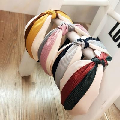 China Wholesale Color Contrast Stripe Art Fabric New Design Fashion Hairwear Fashion Cross Knot Wide Brim Headband For Ladies for sale