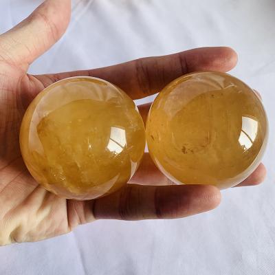 China Europe wholesale price lucky natural calcite crystal orange crystal sphere for sale