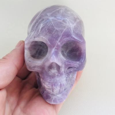 China Europe wholesale hand carved large size natural quartz crystal lepidolite stone skulls for sale