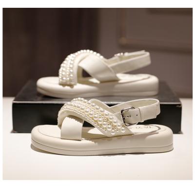 China Fashion Trend Women's Flat Slides With Pearls Slides On Summer Beach Wedding Bridal Shoes Deep Bottom Pearl Sandals for sale