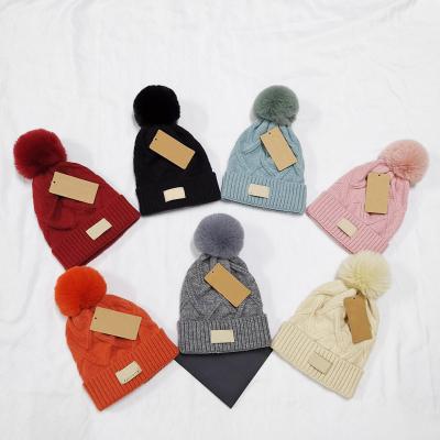 China New Fashion JOINT Beanies Striped Mittens Knit Hat Winter Women Warm Thick Beanies Knitted Pom Pom Hats for sale