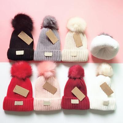 China Brand New Winter JOINT Hat Pompoms Ball Fur Beanie Women Thick Warm Knitted Hats For Girl for sale