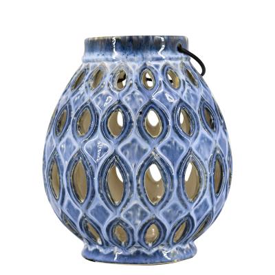 China Wholesale Art Decor European Clay Lantern Retro Ceramic Style Hollow Out Lantern for sale