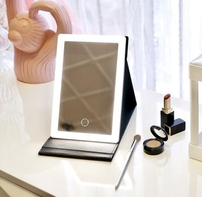 China Hot Selling Travel iPad Lighted Makeup Mirror Square Folding LED Lighted Make Up Mirror With Light for sale