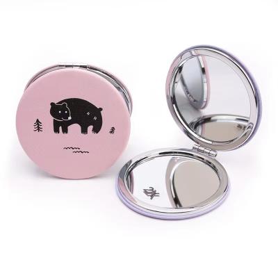 China Custom Logo Magnifying Pocket Mirror Magnifying Compact Folding Portable Small Hand Double Around Double Side Mini Mirror for sale