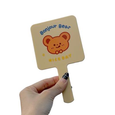 China Wholesale Custom High Quality Custom Logo Shape Model Magnifying Mirrors Hand Held Personalization for sale