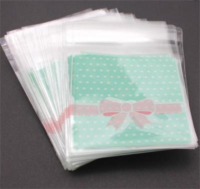 China 100PCS/Bag 7 x 7cm Beautiful Moisture Proof Bowknot Design For Jewelry Gift OPP Package Plastic Bags for sale