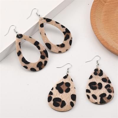 China Unique Vintage Exaggerant Hollow Dangle Teardrop Horse Hair PU Faux Leather Leopard Earrings For Women for sale