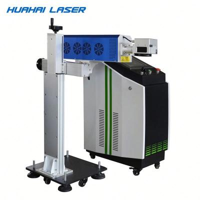 China Huahai 30w/60w CO2 cloth laser marking/wooden/leather/plexiglass machine/laser printing marking paper for sale