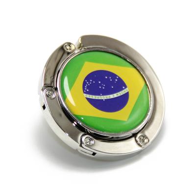 China Promotion Gift World Cup Brazil Flag Handbag Hanger Portable Table Desk Hanging Logo Promotional Foldable Bag Hook Customize Bag Hanger Purse for sale