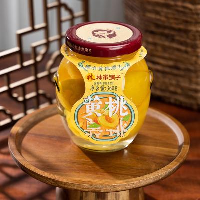 China Canned Canned Yellow Peach in Glass Bottle Sugar Water Leasunfood Linjiapuzi in light syrup canned fruits for sale