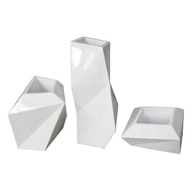 China Irregular Design Scandinavian Creative Custom Fiberglass Planters for sale