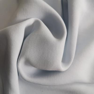 China Antistatic soft rayon nylon twill handfeeling fabric for pants for sale