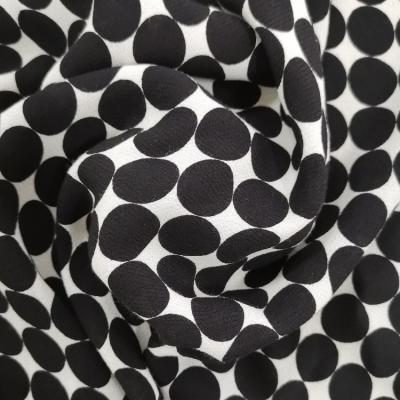 China 2021 Sustainable Hotsales 100% Viscose Twill Crepe Dots Print Fabric For Clothing for sale