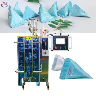 China Food Sachet Face Mask Packing Machine Filling and Automatic Liquid Cosmetic Cream Packing Machine for sale