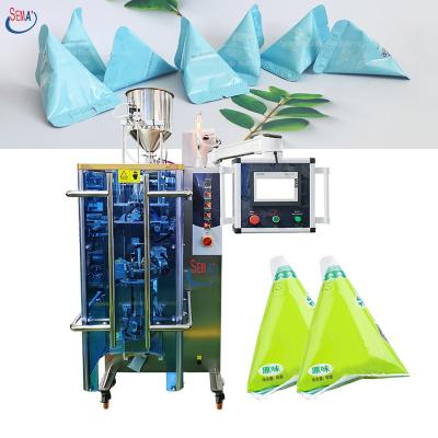 China Food Triangle Shape Filling Machine Liquid Cream Bag Packing Machine for sale