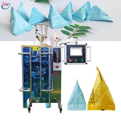 China High Level Food Triangle Shape Liquid / Powder Filling Sealing Machine For Cosmetic Products for sale